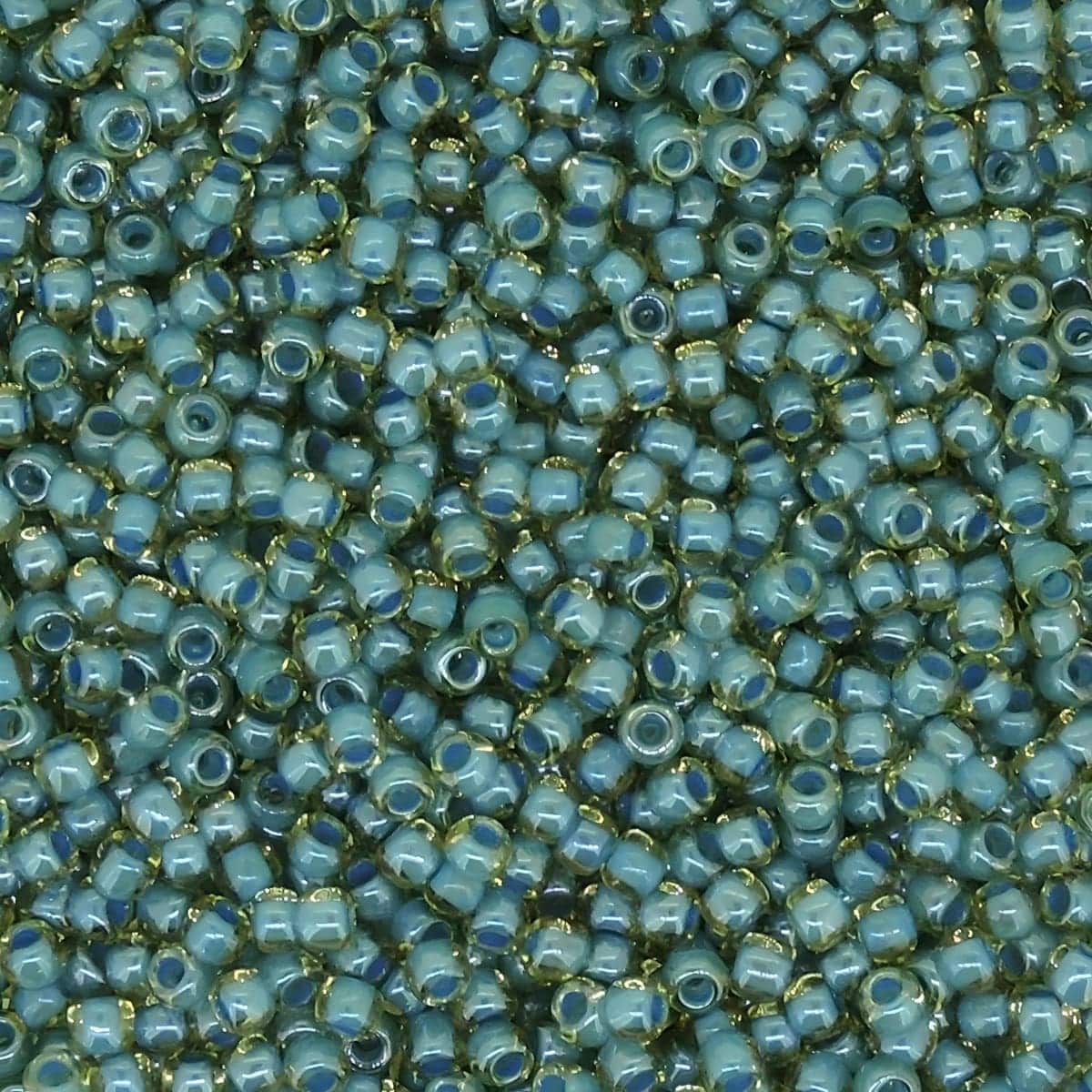 Toho Seed Beads Round Size 11/0 28GM Turquoise Lined Jonquil 11-953