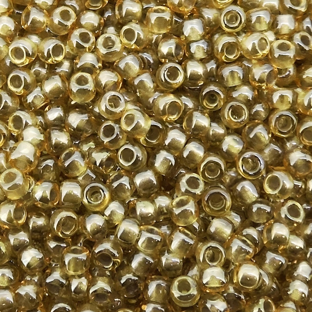 Toho Seed Beads Round Size 11/0 28GM Silver Lined Pale Amber 11-286