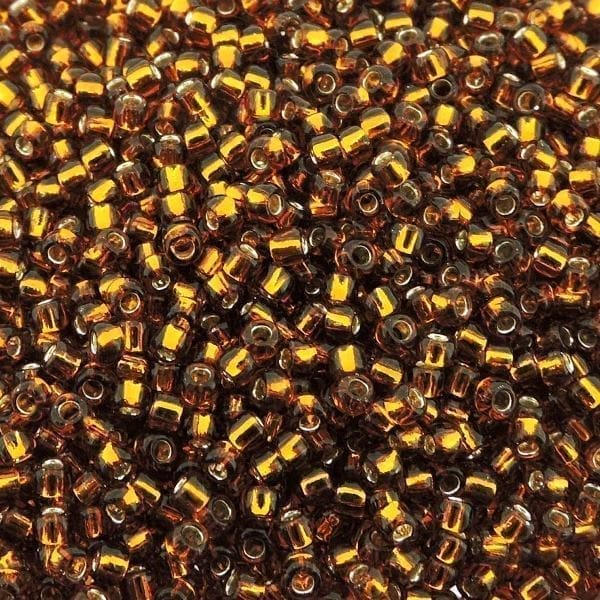 Toho Seed Beads Round Size 11/0 28GM Silver Lined Smoked Topaz