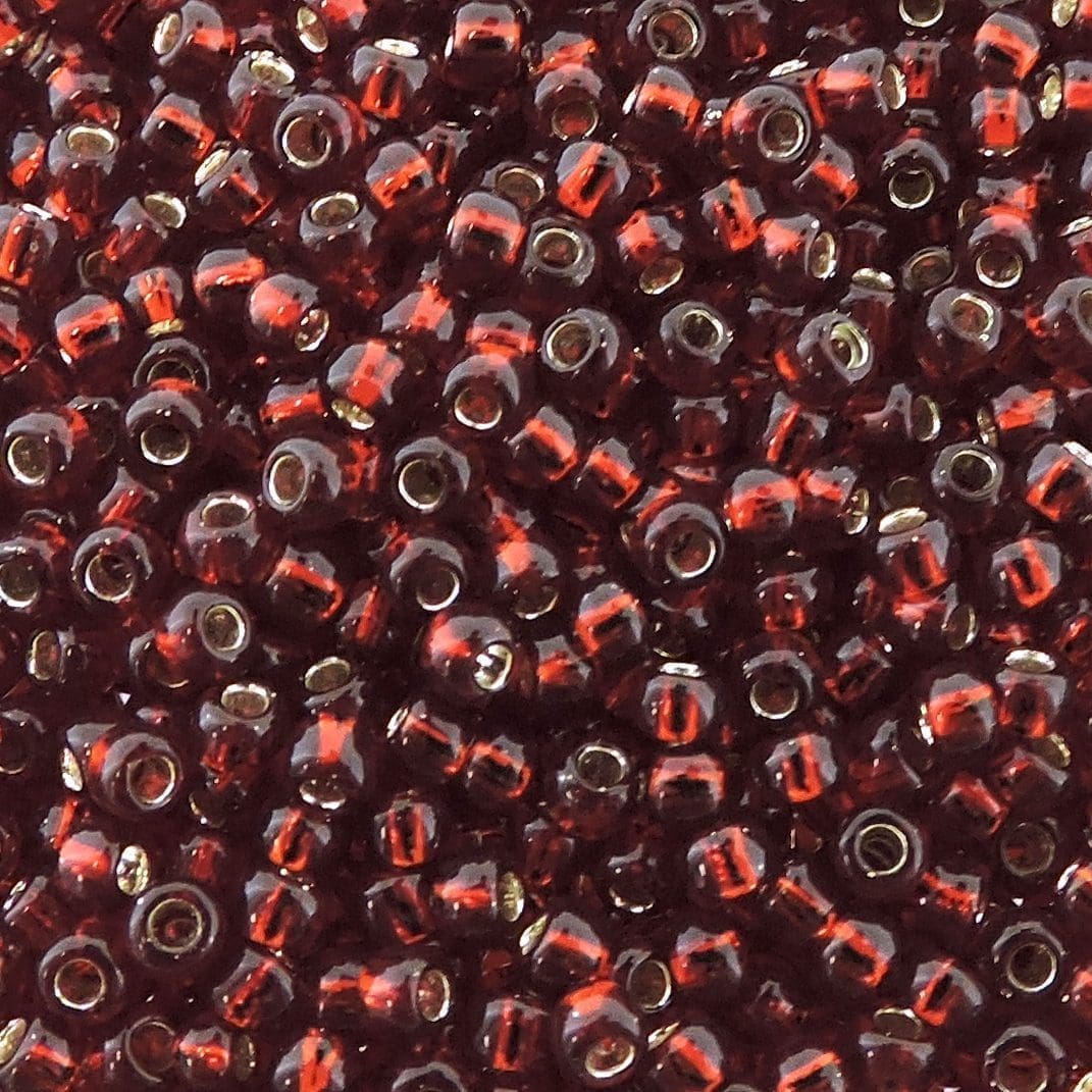 Toho Seed Beads Round Size 11/0 28GM Silver Lined Garnet 11-25D