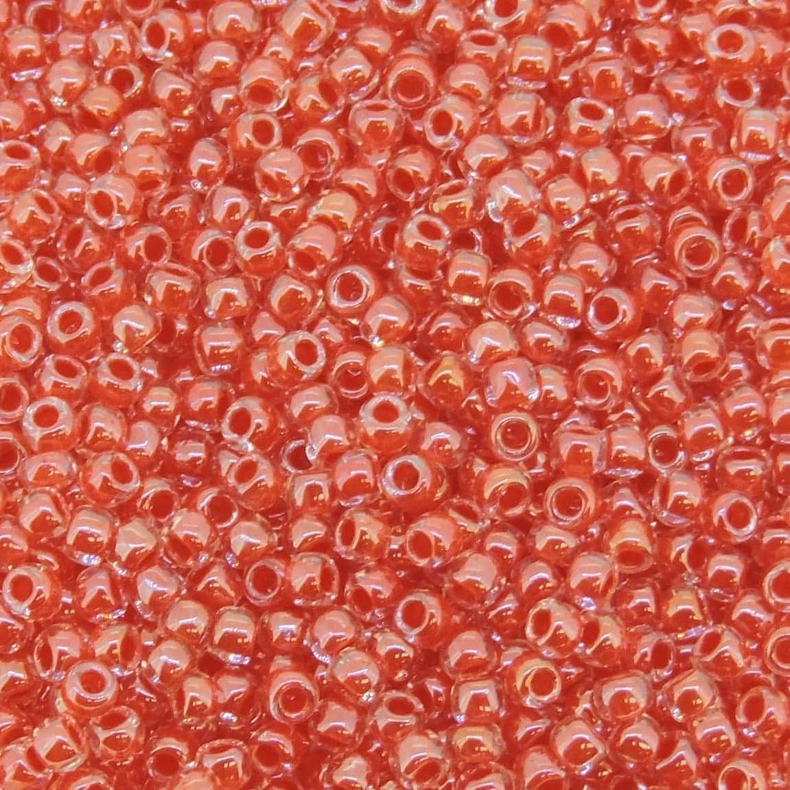 Toho Seed Beads Round Size 11/0 28GM Tomato Lined Crystal 11-341
