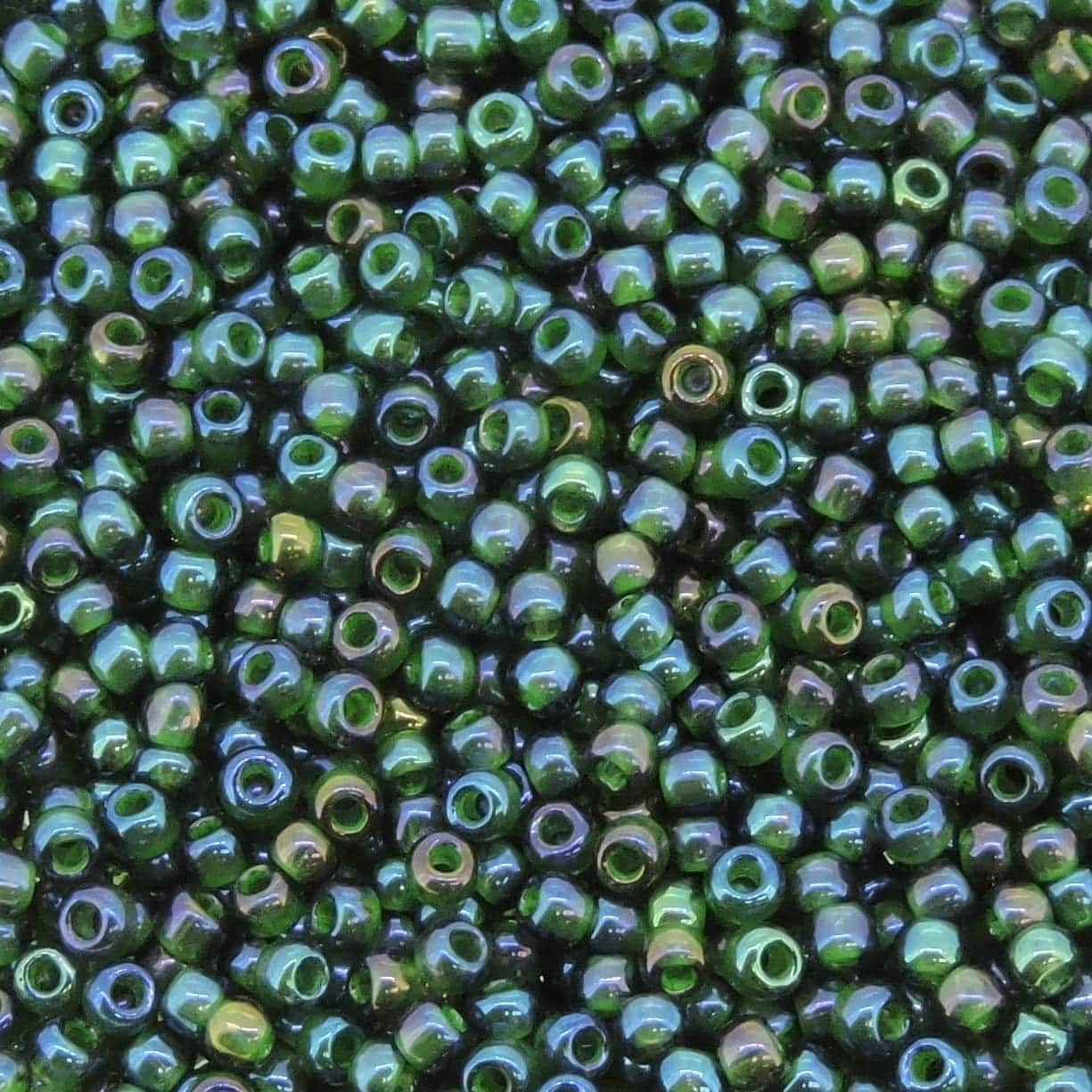 Toho Seed Beads Round Size 11/0 28GM Opaque Green Lined Montana Rainbow 11-384